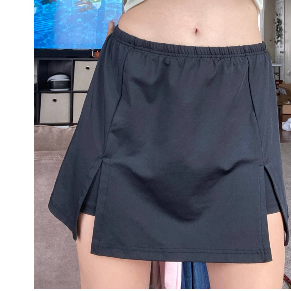 90’s tennis black skort by Vital, size small.